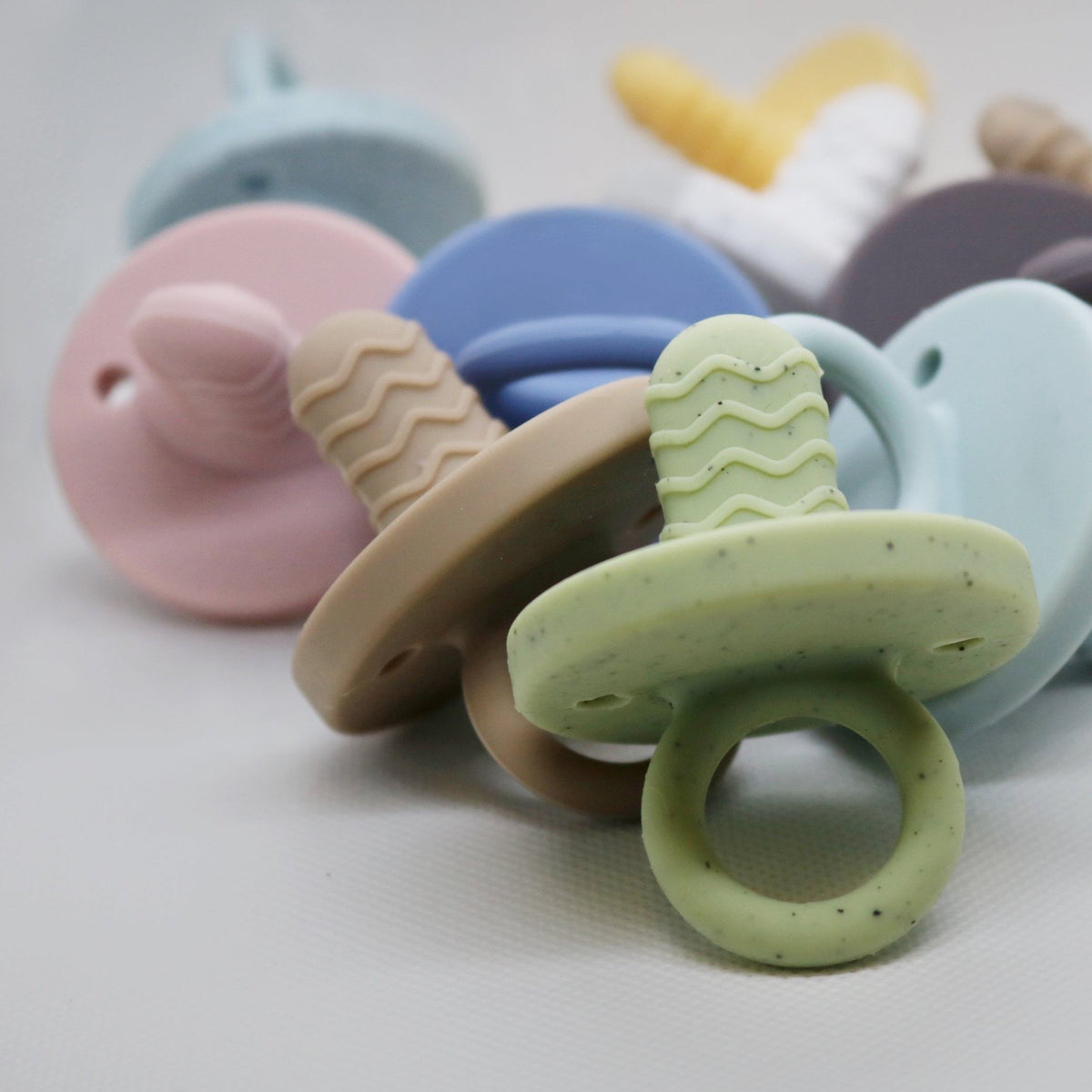 assorted colours baby silicone teethers